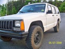 trimmed the fenders, added fog lights, added more agressive tires.