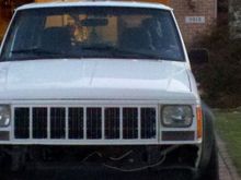Painted my Grille and headlight bezels to match, I have to touch up the black parts. I might get some flexible chrome trim to go on the black parts... Also I took the bumper off so my new one can go on.
