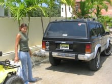 on 2006 her first day at home and already adding decals and fogs jejej, my sis modeling, and i didnt even knew what was an axle.