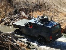 my xj on a small waterfall