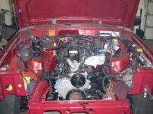 1998 Cherokee
4-25-09 Getting closer. Have the 1999 engine with 44,000 miles in the 1998. (Using most of the 1999 wiring harness). Going to try and fire it on the 1998 computer... for the heck of it!
JKS steering reinforcements on Drivers side. Gets rid of the Aluminum power steering spacer that corrodes away. Also installed the JKS frame reinforcement on Passenger side...