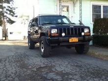 She's lifted on 31's now :)