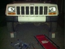 Cut the bottom piece off the stock bumper