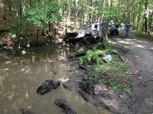 It's deeper than it looks. Got half way in, splashed the engine with water and almost stalled it. Wrangler with winch to rescue.. :/