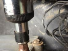5/16th wrench to the 3 screws holding PCM and its out. Plug in the new one and reconnect it all. Easy.