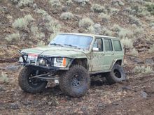 Before wj knuckles actually broke a xj knuckle after this photo was taken kicked off the wj chromo axles shes pretty broken running on pretty much all winch to get out.