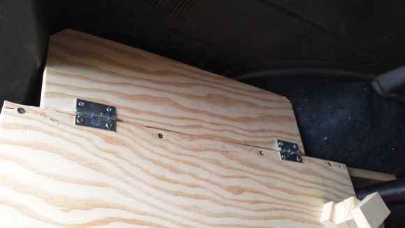 Added some wings to cover the spots behind the wheel wells so the dog wouldn't fall in. Hinges mean easy access.