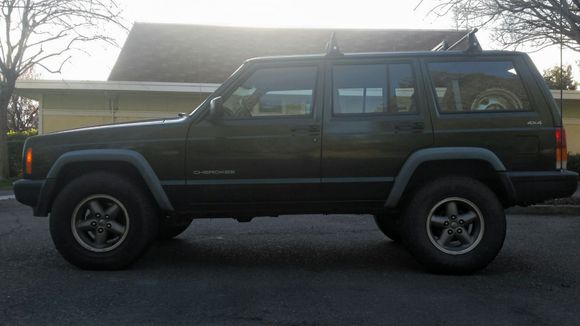 Factory with worn 31" tires & 1.5" blocks & extended shackles in, the rest will have to wait.