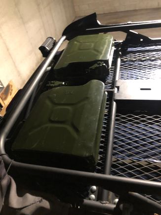 I have these cans already and don’t want to buy Rotopax.  Also want the low profile.  I would obviously make tie down brackets.  Any thoughts?