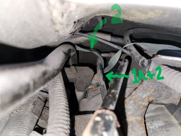 passenger head bolt to body at firewall near TCM