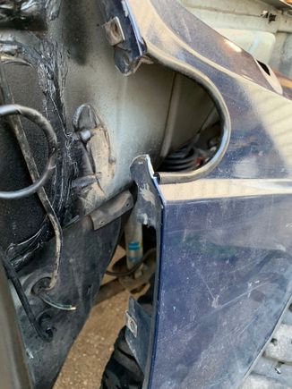Now I can slide the fender in from the front, behind the “A” pillar bar. Then install the bolts just like normal.