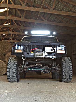 The bumper is on and the 12k lbs winch is hooked up. The bumper is the DIY dirtbound off-road front winch bumper. It was really easy to set up and weld together.