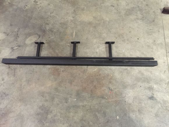 Finished making the rock sliders. 2 inch tube for the part you see. It is 63 inches long and has 30 degree cuts on the ends and has caps. Rocker tie in is 57 inches long and made from 1 inch angle iron with 8 bolts holding it on.3 mounting legs from 1 inch tube with mounting plates and self tapping bolts.