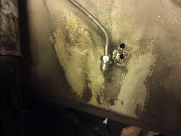 Flare it, then add the bend back.  Make sure it sits where it can mate with the rubber line.