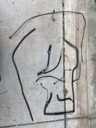 Replaced all this old brittle tubing. Feels good. Like taking a shower after a week camping. And I never would have found the break if i wasn't replacing it all. It was up under the rim of the firewall behind lots of other stuff. 