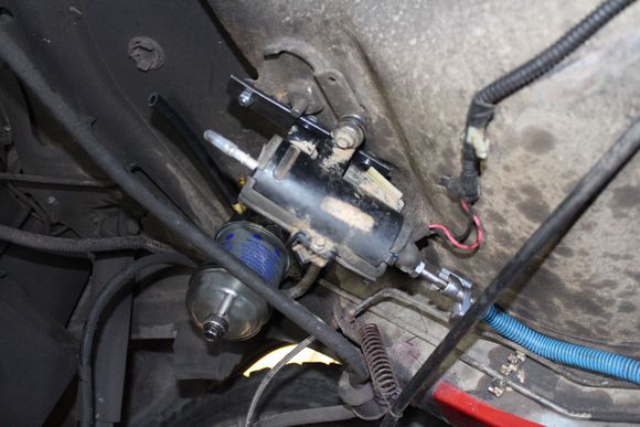 Mounted fuel pump and filter in an "outta the way" spot. drive side just in front of the  rear axle.