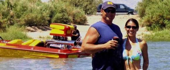 me and honey hanging out at the river. My old boat in the background.