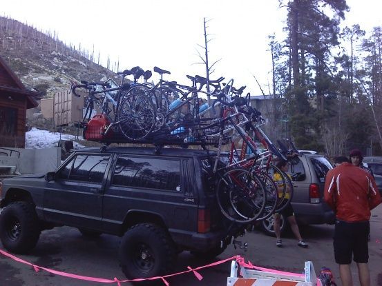 if you count carefully there is 12 bikes, 2 gas cans, and a full sized spare tire on my roof rack.