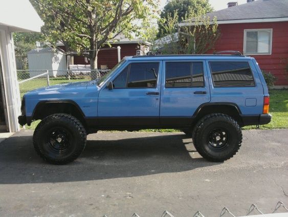 Cut and rolled the fenders, smoked the side markers, and finished tinting my windows.