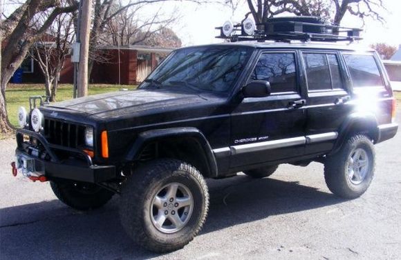 Cherokee after 4.5 RE Coils and 3.5 Rustys leaf packs. Before new wheels. Those BFG KO's really tore it up. I hope the mud terrains work as good as those.