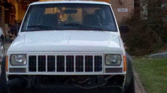 Painted my Grille and headlight bezels to match, I have to touch up the black parts. I might get some flexible chrome trim to go on the black parts... Also I took the bumper off so my new one can go on.