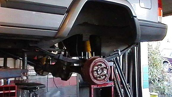 Leaf Springs, 4 Degree Shims &amp; Shocks installed. Rear sway bar removed and trashed. CV drive shaft installed. Still need to do the brake lines. NOT A SINGLE BROKEN BOLT!! :)