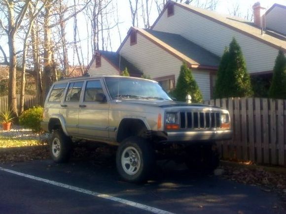 Day I bought her.  Half installed Rough Country short arm kit.  What ever was installed was still only hand tightened.