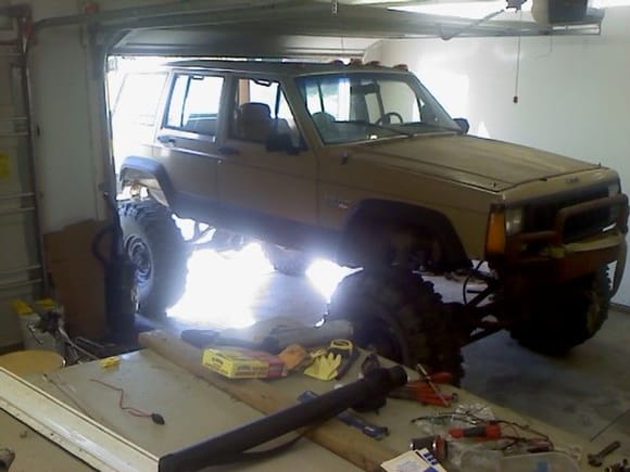 jeep in garage as you can see theres less then a inch between the jeep and the door... actually hits at times if you dont go slow enough