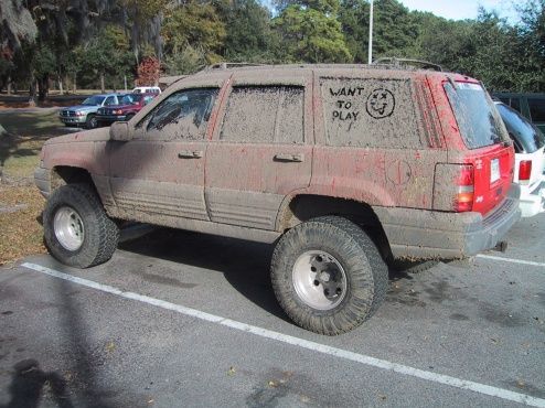 my first jeep... 97 ZJ TSI 3.5in EZ ride lift with 2in coil spacers and 33's with MT classic 2's... was stock when i got it... first lift i ever installed...