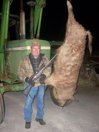 my custom rifle man with his boar.
