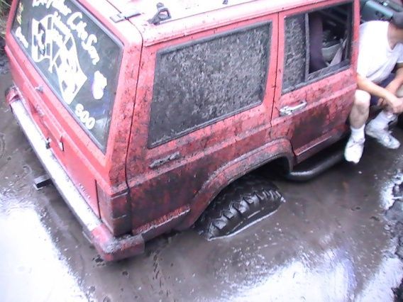 YUP!!! that's my dad, just chillin in the dead jeep that wouldn't start lol, white socks and all... they always end up black! lol