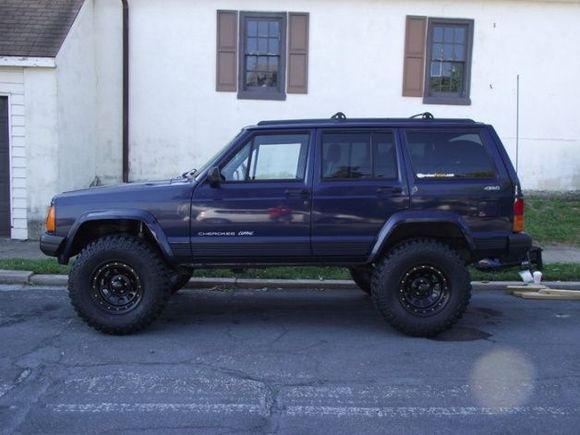 huge difference in looks from the 30X9.50X15 Dakota AT's that were on there for the last year....had to trim the inside rear of the front fender on both sides for clearance. Thinking I might go with a 1.75" coil spring spacer on the front and a 1.5" shackle for the rear