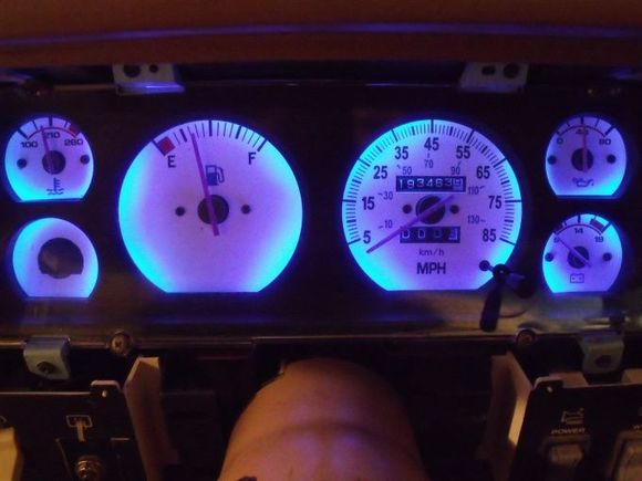 Custom blue LED backlighting with white gauges.