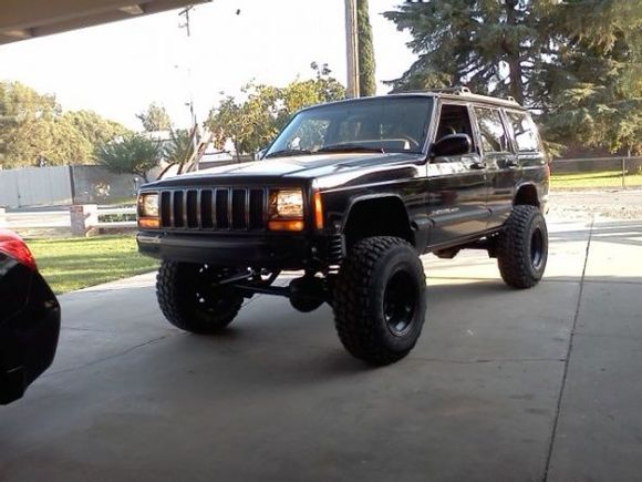 fenders all trimmed waitin on my new lights CAN RUN SKINNY 35S BUT LIKE TO MAKE IN MORE CHALLENGING ON 31S AN RUNNING 15/10 WITH 4 INCH OFFSET GIVES THE TIRES THE STRETCH ON LOOK AN STANCE IS VERY STABLE
