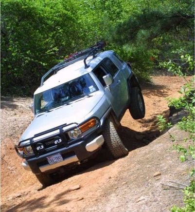 The FJ showing off the stiff rear end.  That thing is wide and heavy.
