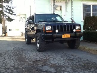 She's lifted on 31's now :)