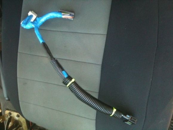Harness made from another TCU and it's plug from the AW4- plugs in between stock harness and TCU