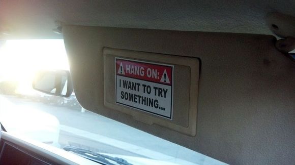 Sticker on passenger sun visor