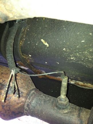 Old O2 sensor, can't imagine why it doesn't work with 3 of 4 wires broken off lol.  This little guy didn't want to budge, was a real pain to get it loose, but I had a friend that was able to get it loose for me. :)