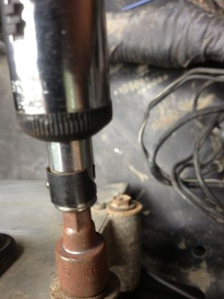 5/16th wrench to the 3 screws holding PCM and its out. Plug in the new one and reconnect it all. Easy.