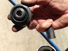 Two piece OEM bushing in the left, replacement Moog K200792 bushing in the right. Resolved my twitchy steering issue!