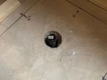 I had to break a hole in the concrete floor to put the shower drain into, the pan sits directly on the floor