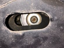 The bolt for the serpentine belt tensioner should be in the middle of the slotted hole inside the passenger side front wheel well. If it’s low in the hole, the engine mount is toast! 