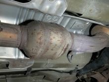 These are the catalytic converters under your SS . 
I’m thinking someone’s going to cut them they aren’t taking them to a reputable place to sell them, so marking them would be a waste of your time. 