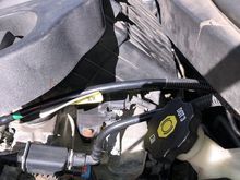 This piece I cut from a Cobalt at a parts yard, longer to move that connector back by the fire wall