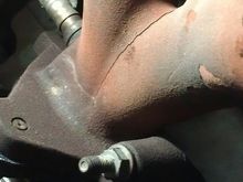 The heat shield has been removed, see the O2 sensor in the manifold and the crack in the manifold 