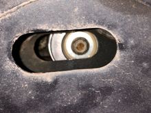 The tensioner mounting bolt should be in the centre of the slotted hole.