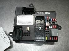 A look under the orange plug, we see the metal threaded nut, which might be loose.