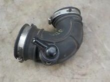 The clamp on the left is the throttle body end the PCV hose attaches to the shiny black fitting. 