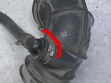 Look at this area of the elbow for oil, it can get sucked from the valve cover, the solution is to soak the valve cover in warm water and Dawn dish soak over night. 